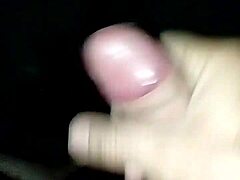 Sperm-covered hands give a handjob to a big cock