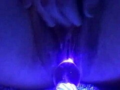 Wet and wild: A shaved pussy glows in the dark