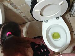 Piss slave takes on a piss and gets pleasured by her master