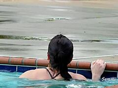 Amateur wife flashes big ass in thong bikini at campground pool