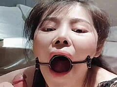 Severe oral pleasure with tears and mouth forced open